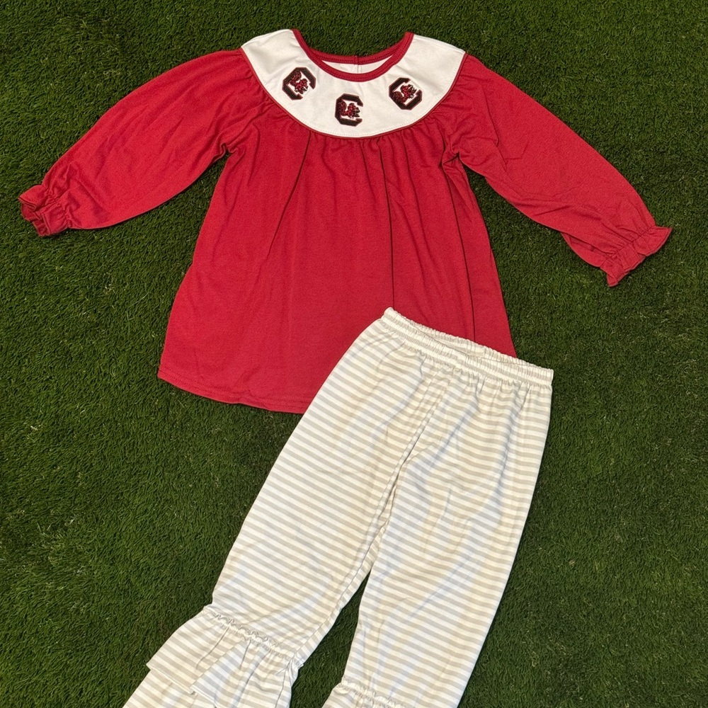 Gamecock outfit embroidered top and ruffle pants.